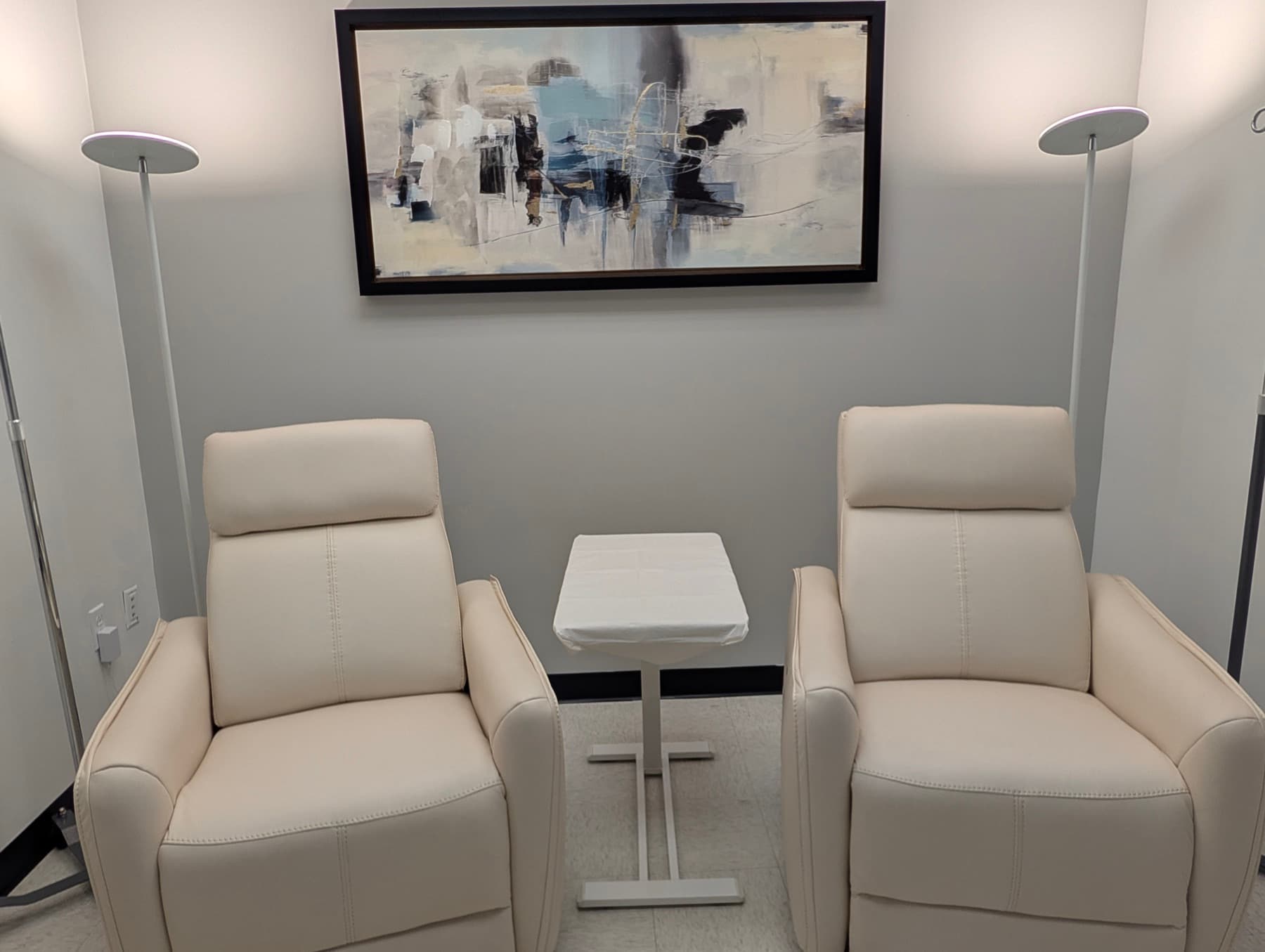 Private IV therapy suite at Aspire with twin leather recliners